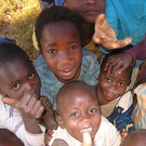 Amid Recession, Children With HIV Worldwide Are In Need Of Homes
